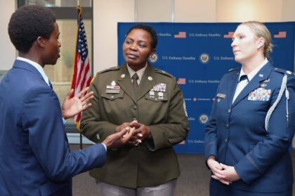 U.S. Africa Command’s Sgt. Maj. Herinah Asaah (center) and chaplain senior enlisted leader speaking with (right), at the U.S. Embassy in Windhoek, Namibia, speaking with embassy staff.