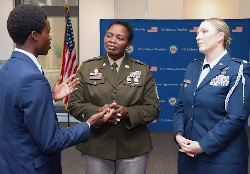 U.S. Africa Command’s Sgt. Maj. Herinah Asaah (center) and chaplain senior enlisted leader speaking with (right), at the U.S. Embassy in Windhoek, Namibia, speaking with embassy staff.